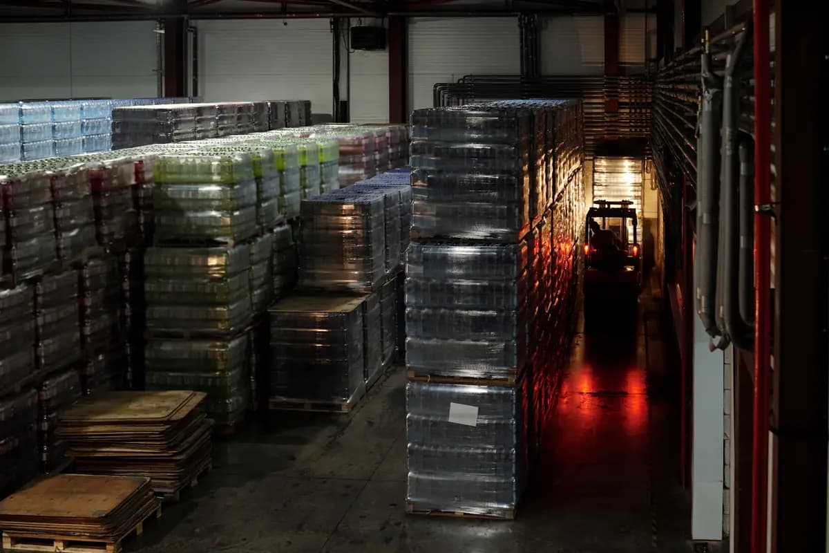 A warehouse storing pallets of bottled water
