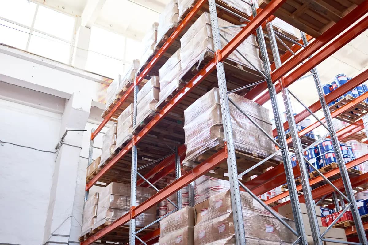Warehouse racks holding wrapped boxes