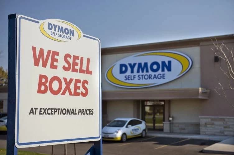 A DYMON Self Storage building with its sign