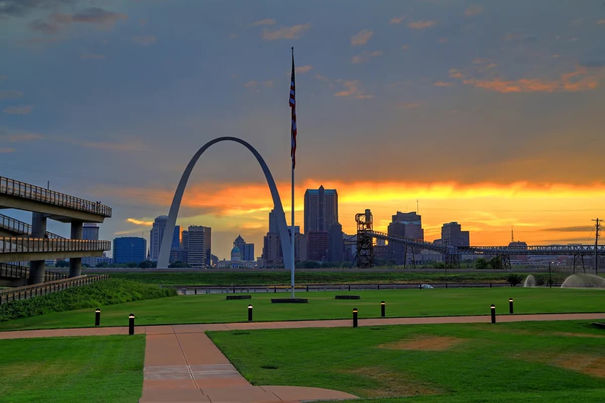 The Gateway Arch at sunset over the St Louis riverfront